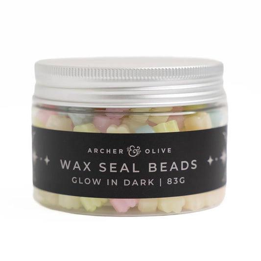 Archer & Olive Glow in Dark Wax Seal Beads - in een pot op een witte achtergrond