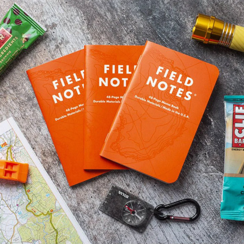 Field Notes Expedition notitieboek met oranje omslag en dot-grid pagina's